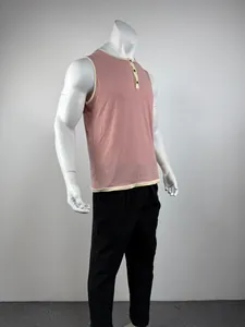 Side view of men's pink Henley sleeveless tank top with cream contrast trim.