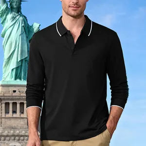 Detail shot of a black long-sleeved polo shirt with white collar tipping on a male model.