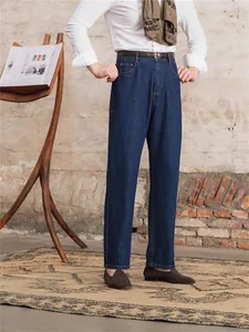 Classic dark blue straight leg jeans for men with mid-waist and ankle length design