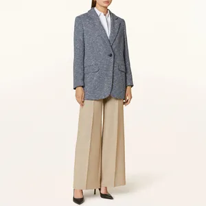 Professional blue textured blazer featuring premium buttons on elegant fashion model