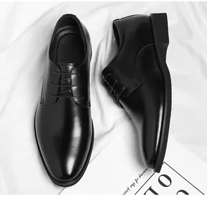 Polished black men's business formal dress shoes featuring a classic lace-up design