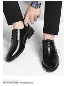 Detail view of classic men's black leather formal shoes with elegant lace-up design