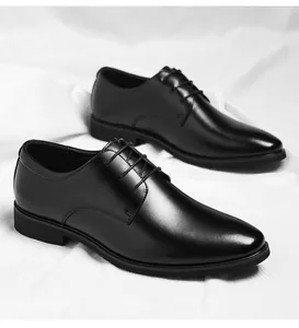 Classic black men's business leather dress shoes featuring a sleek lace-up design