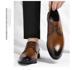 Close-up detail of brown gradient men's business leather shoes with lace-up closure