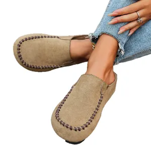 Vintage suede clogs with platform sole and whipstitch detail for women