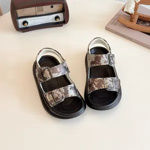 Stylish camouflage kids beach sandals with adjustable straps and breathable open-toe design.