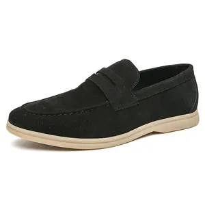 Black suede slip-on loafers with tan sole for men, comfortable casual driving shoes.