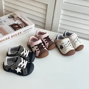 Three pairs of toddler walking shoes in multiple colors with velcro straps and star patterns