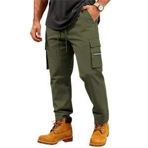 Men's olive green tactical cargo pants with multiple pockets and drawstring waist