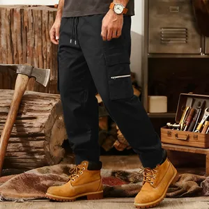 Men's loose black tactical cargo pants with multi-pocket design in workwear style