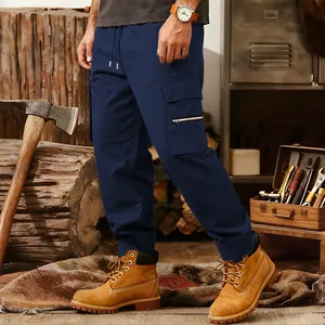 Close-up of navy blue tactical cargo joggers with multiple pockets and drawstring