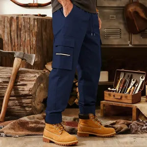 Detailed view of men's navy blue cargo joggers featuring tactical multi-pockets and drawstring