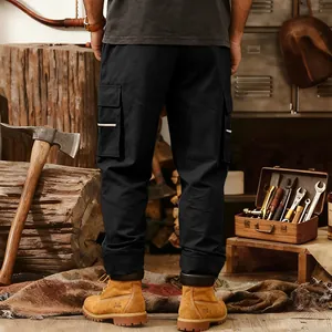 Detailed back view of heavy-duty men's black tactical cargo pants with multi-pockets.