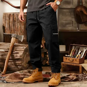 Detailed view of men's loose black tactical cargo pants featuring multi-pocket high street style
