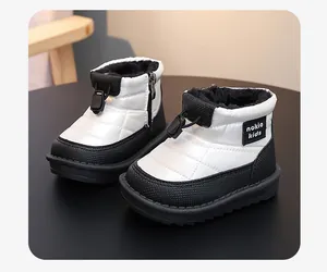 Close-up detail of waterproof quilted toddler snow boots with a warm fleece lining