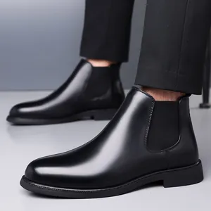 Classic men's black Chelsea boots with smooth leather finish and elastic side panels