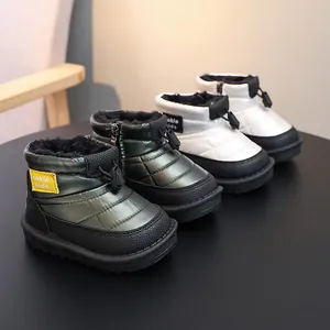 Waterproof kids winter snow boots with warm plush lining and side zipper closure in green and white