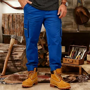 Macro detail of blue men's tactical cargo pants featuring multi-pockets and relaxed fit
