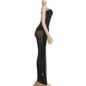 Detailed side view of a black mesh patchwork tube top footed jumpsuit on a mannequin