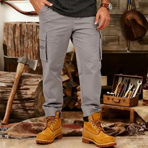 Close-up detail of men's grey tactical cargo sweatpants featuring multi-pocket design