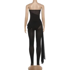 Back view of black mesh patchwork strapless footed jumpsuit for women