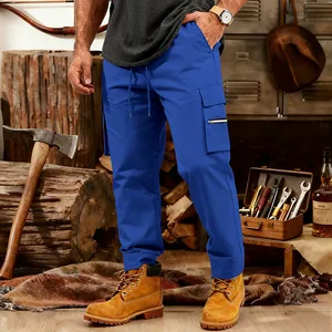 Men's loose fit blue cargo pants featuring tactical multi-pockets and drawstring waist.