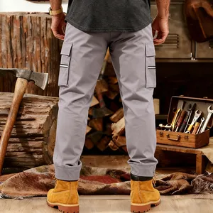 Detailed back view of grey tactical cargo pants with multi-pockets and reflective strips