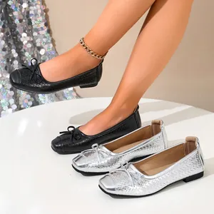 Elegant French woven ballet flats featuring a square toe and bow detail in black and silver