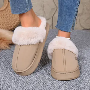 Warm beige winter home slippers featuring plush faux fur trim and elevated platform soles