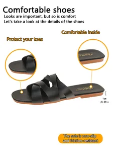 Detailed view of women's black flat sandals showing 1cm non-slip sole and strap design.