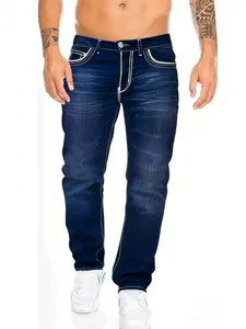 Detailed view of men's slim-fit dark blue jeans with distinctive white double stitching