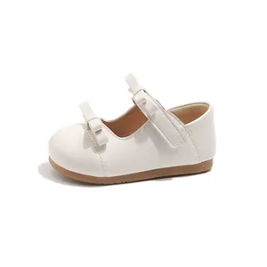 Elegant creamy white toddler girl Mary Janes with retro double bow details for spring