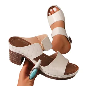 Elegant cream quilted high-heel mules with brown textured block heel for summer
