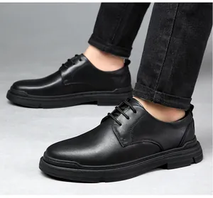 Detailed side view of men's black leather casual shoes with non-slip soft rubber soles
