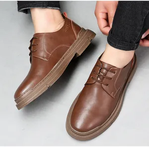 Close-up of brown leather men's casual shoes with soft non-slip soles being worn