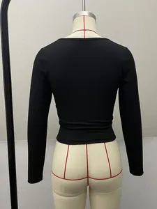 Back view of black slim fit ribbed long sleeve knit top on a professional tailor mannequin