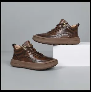 Macro detail of luxury brown top-grain leather high-top sneakers for men in a studio setting
