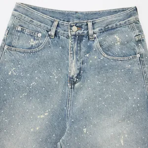 High-waist vintage washed loose denim jeans with paint splatter and rhinestone details