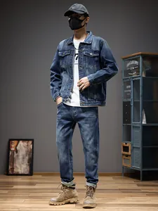 Men's classic blue denim suit featuring a washed jacket and matching straight-leg jeans