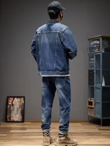 Professional men's casual blue denim outfit set featuring jacket and matching jeans.
