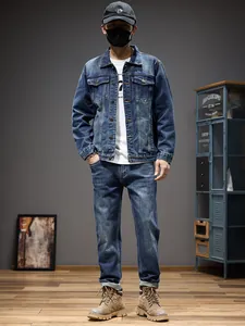 Stylish men's casual blue denim jacket and jeans set shown in a full-length studio portrait