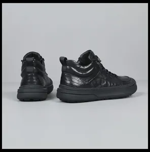 Back view of premium black leather high-top sneakers with durable rubber soles