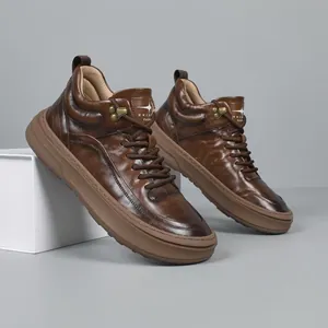 Premium brown leather high-top sneakers for men with a stylish and comfortable casual design