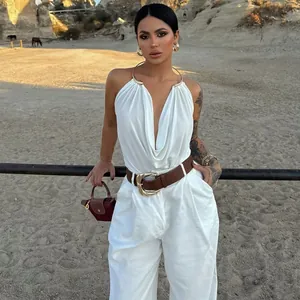 Sexy white halter neck top with metallic ring detail and elegant draped cowl neck