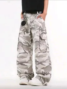 Washed grey camouflage wide-leg cargo pants with multiple large utility pockets.