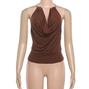 Detailed view of women's brown cowl neck halter top with elegant gold metal collar