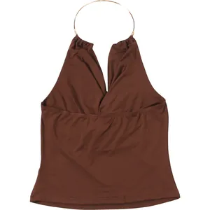 Detailed view of the brown halter neck tank top featuring a stylish metal ring design