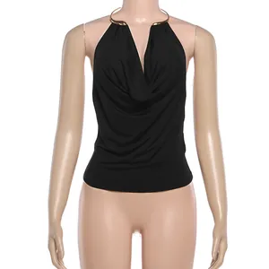 Frontal detail of a chic black halter top with metal neck ring and cowl neckline