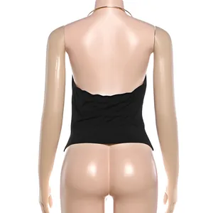 Detailed back view of a sexy black backless halter top with a gold metal ring