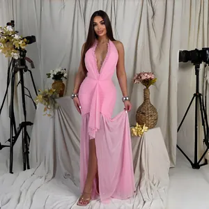 Full view of elegant pink halter neck pleated dress with sexy mesh patchwork detail